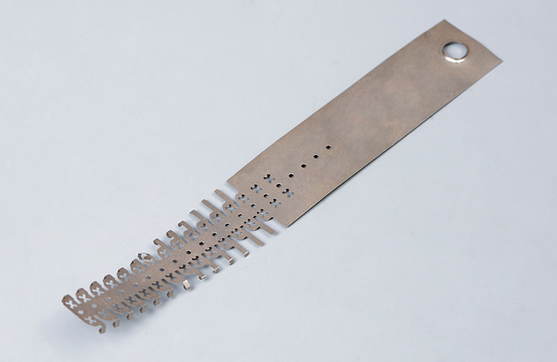 充電(diàn)器(qì)彈片料帶